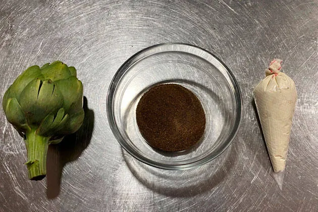 Buñuelo líquido de queso Carrat, alcachofa y trufa