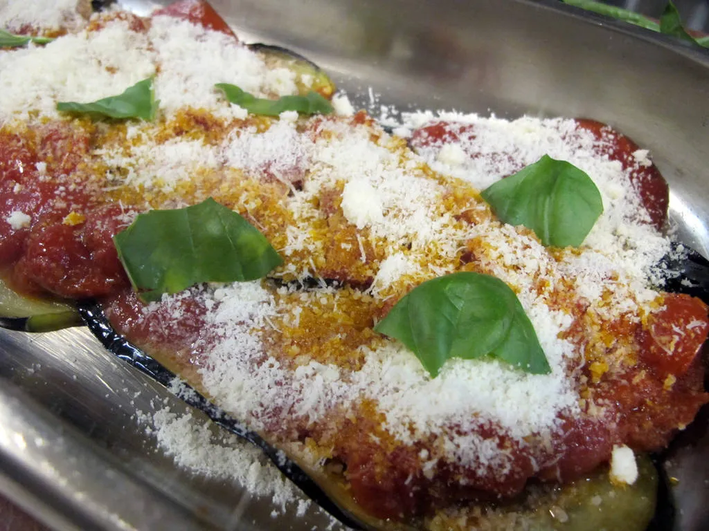 Espolvorear queso parmesano.