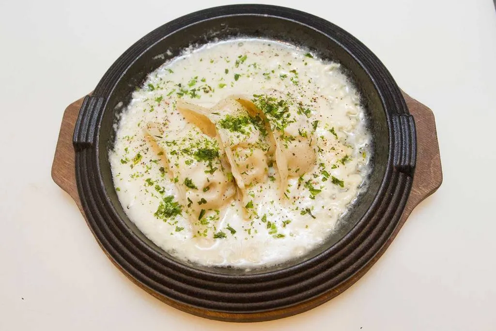 Kotoro. Gyoza shabu shabu con salsa de queso