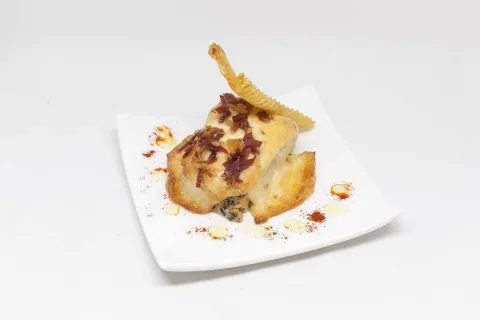 Púding de bolets amb patata trufada