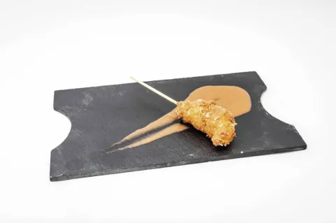Envuelto de langostino en panceta ibérica